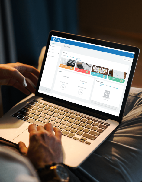 mockup-of-a-man-using-a-macbook-in-a-cozy-living-room-2324-el1-min